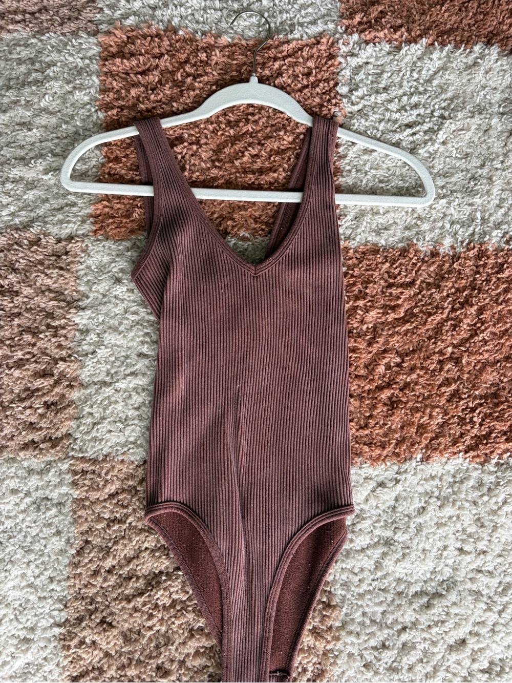 Aura Ribbed One-Piece Bodysuit in Deep Brown